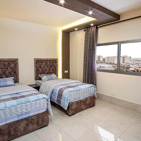 Al Riyati Hotel Apartments Akaba Buitenkant foto