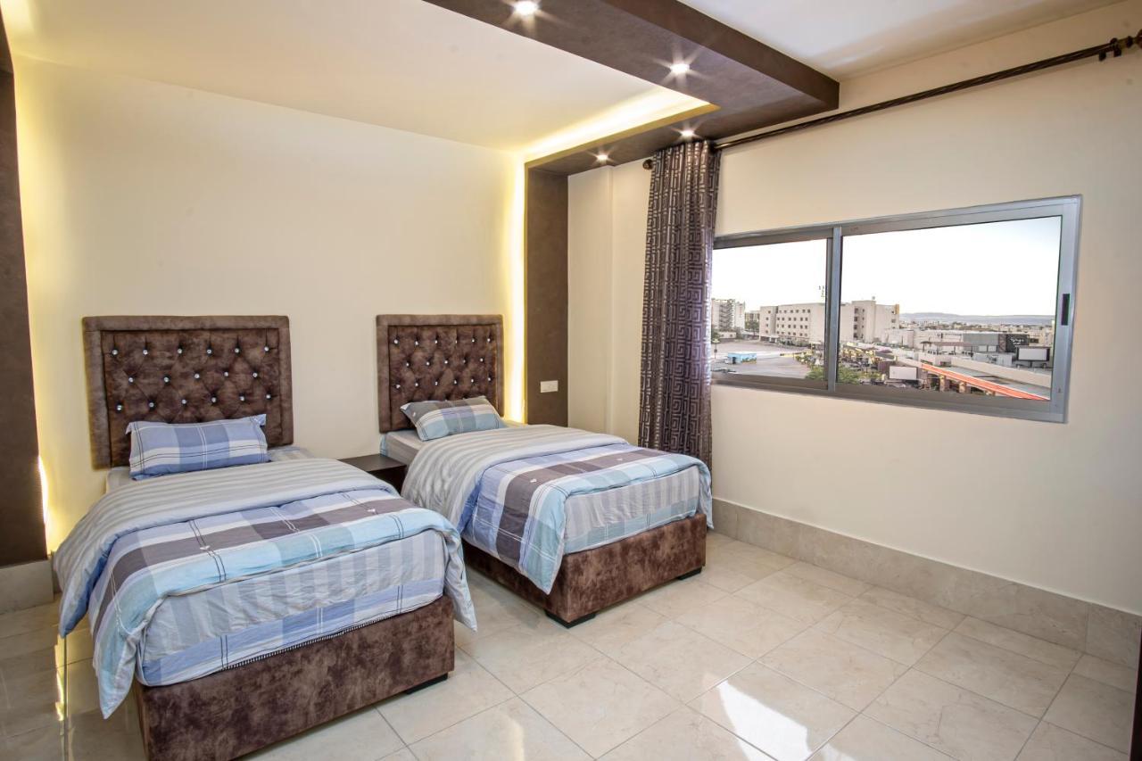 Al Riyati Hotel Apartments Akaba Buitenkant foto